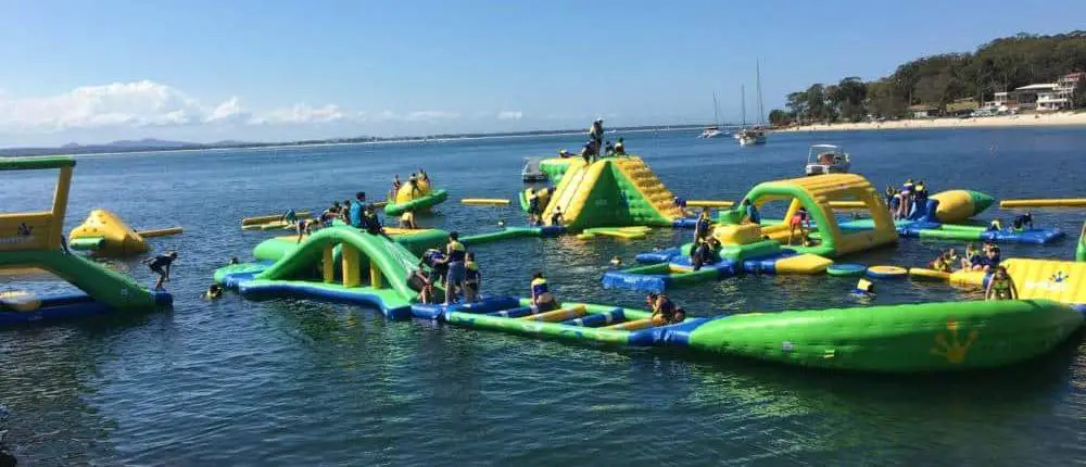 Inflatable floating obstacle course