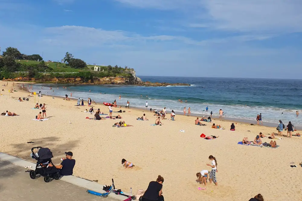 People sunbathing at Coogee Beach