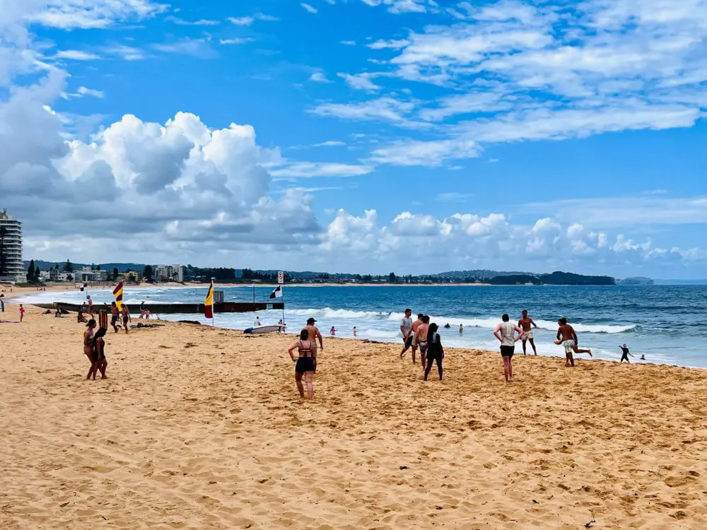 Playing rugby at Collaroy Beach