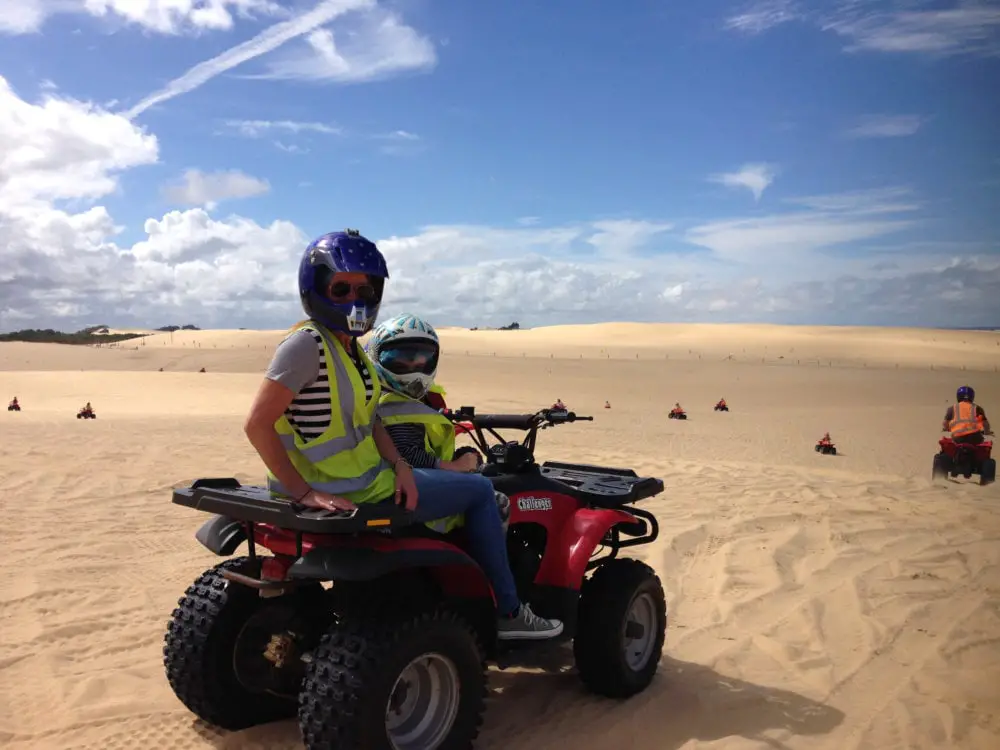 Mother and son on quad bike