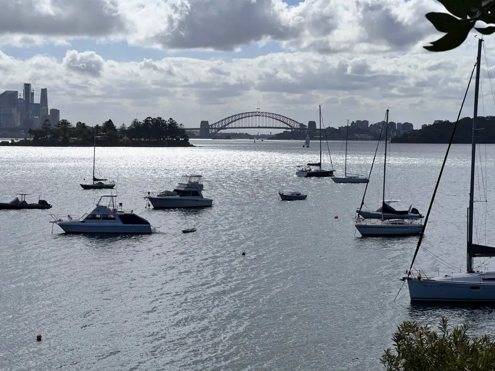 Sydney Harbour and Harbour Bridge with boats on the water